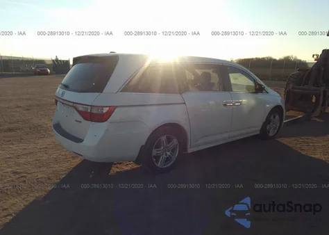 2012 Honda Odyssey Touring z USA, uszkodzony, nr VIN 5FNRL5H9XCB014055